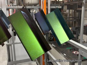 Behindertenwerkstatt Reinsdorf - Pulverbeschichtung mit Flipflop- bzw. Chamäleonlack